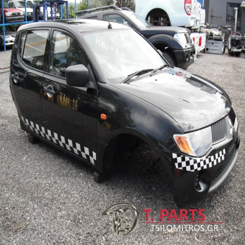 Καμπίνα Mitsubishi L200 2006–2009 — φωτογραφία 1